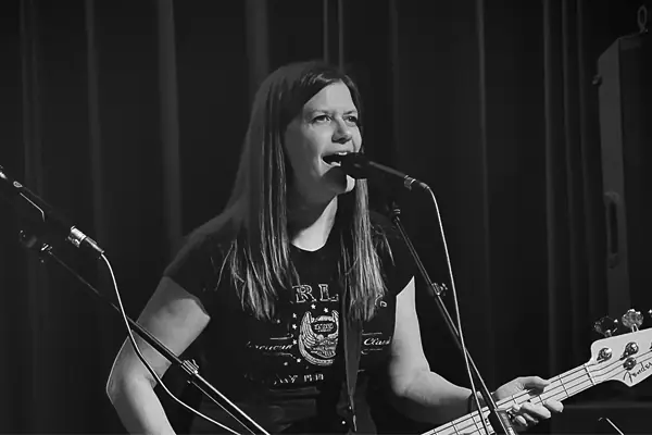 Sheri Roloff playing bass guitar